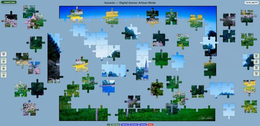 Artisan Jigsaw in Full Screen Full-screen Artisan Jigsaw tabletop showing loose pieces, joined clusters, eight Sorting Boxes and compact controls.